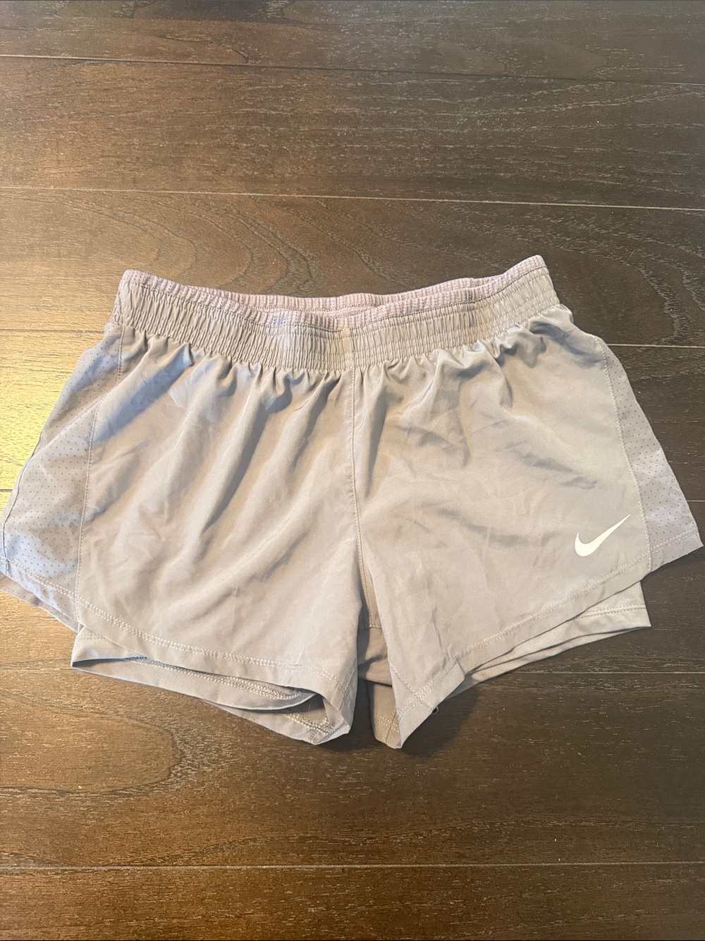 Nike Women's Light grey Athletic Shorts with White Swoosh